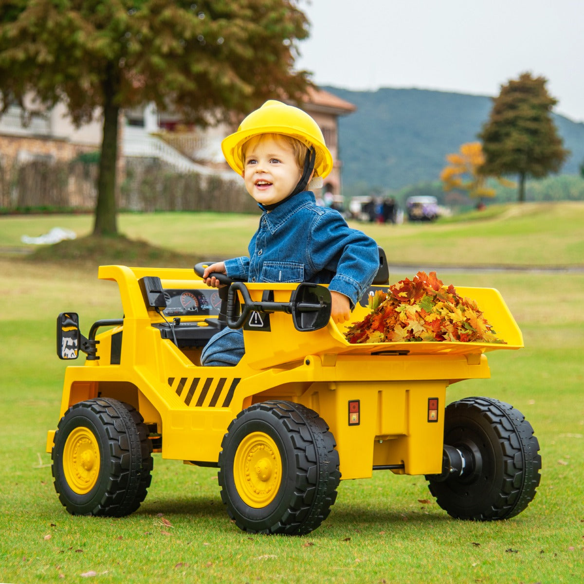 Caterpillar – elbil för barn 12V dumper att sitta på med sandskyffel och tippbädd megafon – Gul