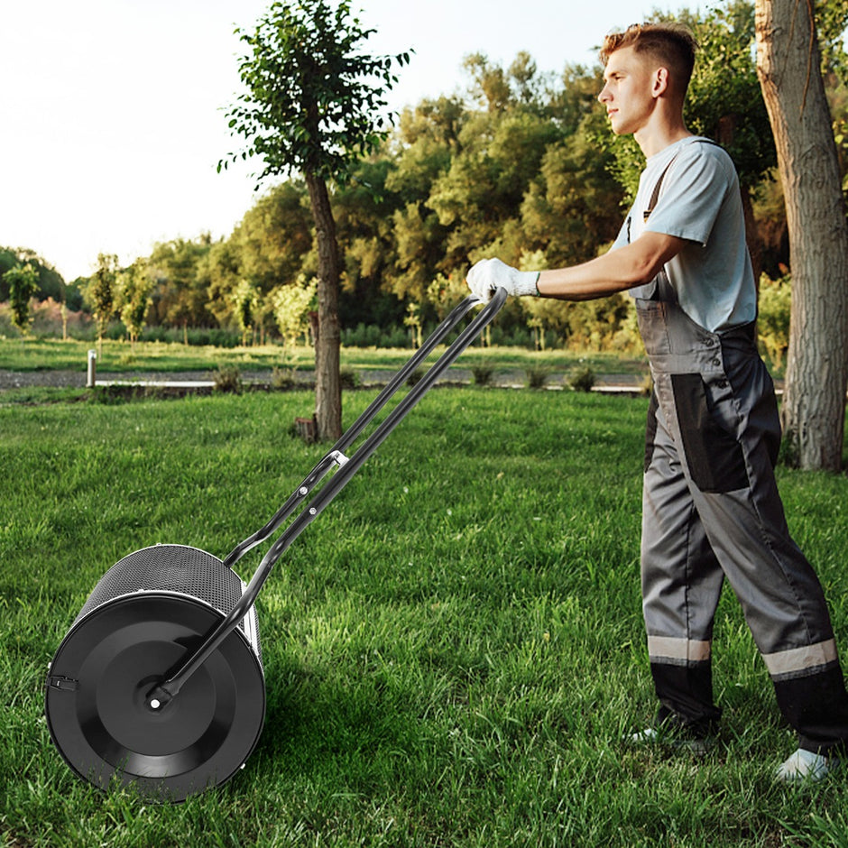 Bred – kompostspridare med förbättrade sidospärrar och U format handtag – 68 cm – Svart